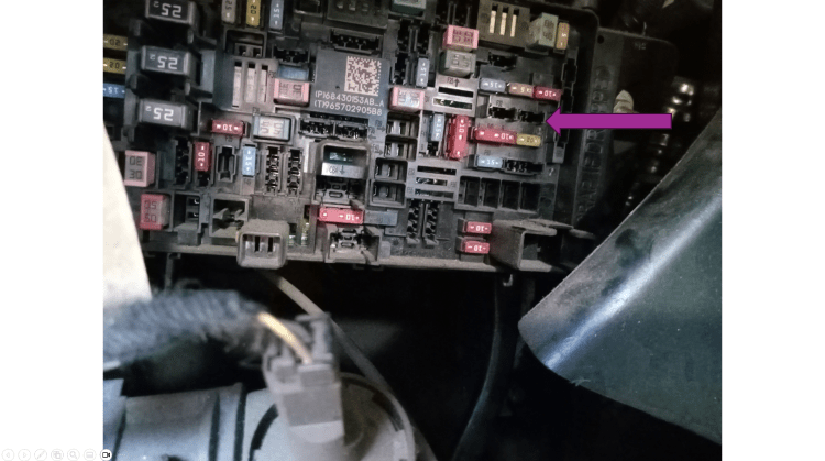 passenger compartment fuse box under dash steering wheel fuses truck drivers side panel removed and the location of where the F33 10 amp fuse used to be is shown by the purple arrow and NO MORE PUSH TO TALK 2020 dodge ram 1500